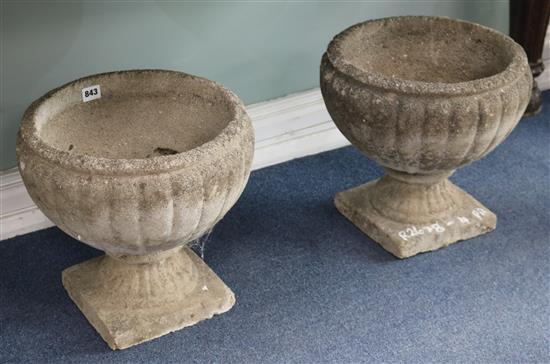 A pair of garden urns, H.34cm
